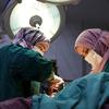 Medical workers perform an emergency operation at the Idlib Maternity Hospital in Syria. 