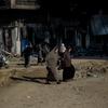 Two women cross the road in the center of Gaza City. (file)