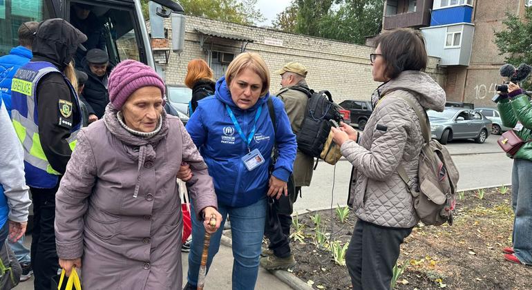 People, fleeing hostilities in the front-line areas are arriving to the transit centre in Kharkiv.