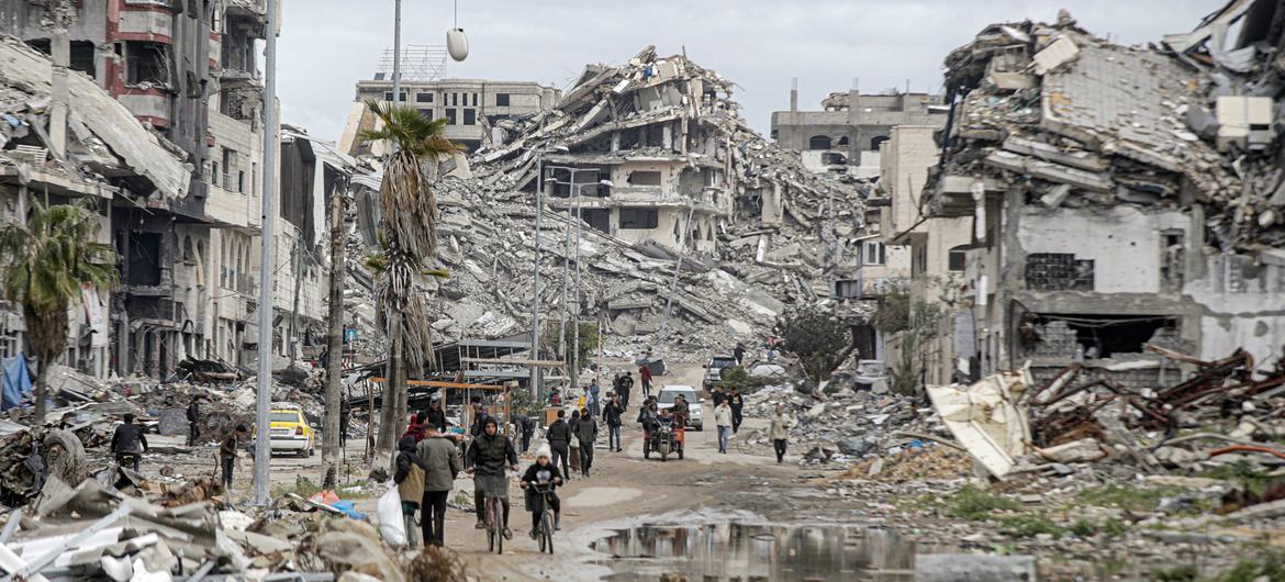 People return to devastated neighbourhoods in northern Gaza. About 90 per cent of the enclave's housing units are in ruins.