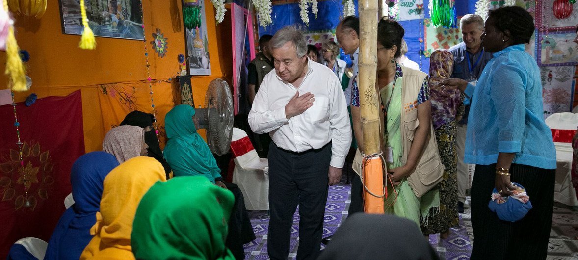 UN Secretary-General António Guterres (center) meeting with Rohingya refugees during a visit to Cox’s Bazaar, Bangladesh in July 2018.
