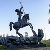 A view of the sculpture - Good Defeats Evil - on the UN Headquarters grounds, presented to the UN by the Soviet Union on the occasion of the Organization’s 45th anniversary. 