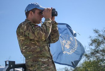 An UNFICYP peacekeeper takes part in a routine patrol along the buffer zone in Cyprus. 