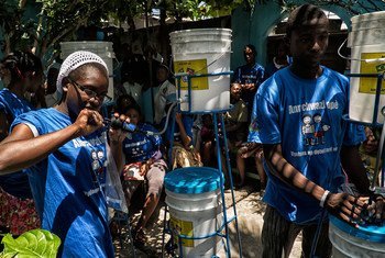 As part of joint efforts between the UN and the Government of Haiti to fight cholera, water filter systems are distributed in Cité Soleil, Port au Prince.