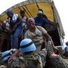 UN peacekeepers in Haiti support the relocation of people ahead of the arrival of a tropical storm. (file 2010)